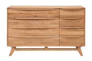 Die Kommode Bara 8Z aus massiver Eiche bietet acht geräumige Schubladen für perfekte Ordnung in Ihrer Einrichtung. Sein elegantes Design und seine solide Konstruktion werden dafür sorgen, dass er eine stilvolle und praktische Ergänzung für jedes Zuhause wird."