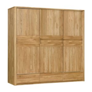 Der Massivholzschrank Lausanne 3 mit drei Schiebetüren wertet nicht nur das Aussehen Ihres Schlafzimmers auf, sondern wird Ihnen auch viele Jahre lang dienen. Er besticht durch die natürliche Holzmaserung und das zeitlose Design. Das praktisch gestaltete Innere bietet eine Kombination aus Fachböden, Kleiderstange und zwei Schubladen, sodass Sie alle Dinge übersichtlich geordnet und immer griffbereit haben.