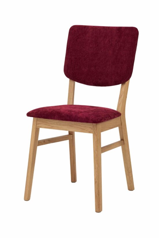 Der Stuhl Tallin kombiniert die natürliche Schönheit massiver Eiche mit einer markanten roten Polsterung, die jedes Interieur belebt und ihm ein modernes Aussehen verleiht. Die ergonomisch geformte Rückenlehne sorgt zusammen mit der bequemen Polsterung für hohen Sitzkomfort. Dank des zeitlosen Designs und der hochwertigen Verarbeitung ist er eine hervorragende Wahl sowohl für den täglichen Gebrauch als auch für besondere Anlässe.